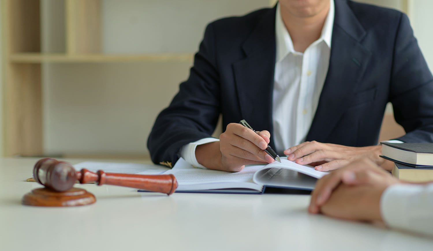 Car Accident Chiropractic lawyer discussing a settlement.