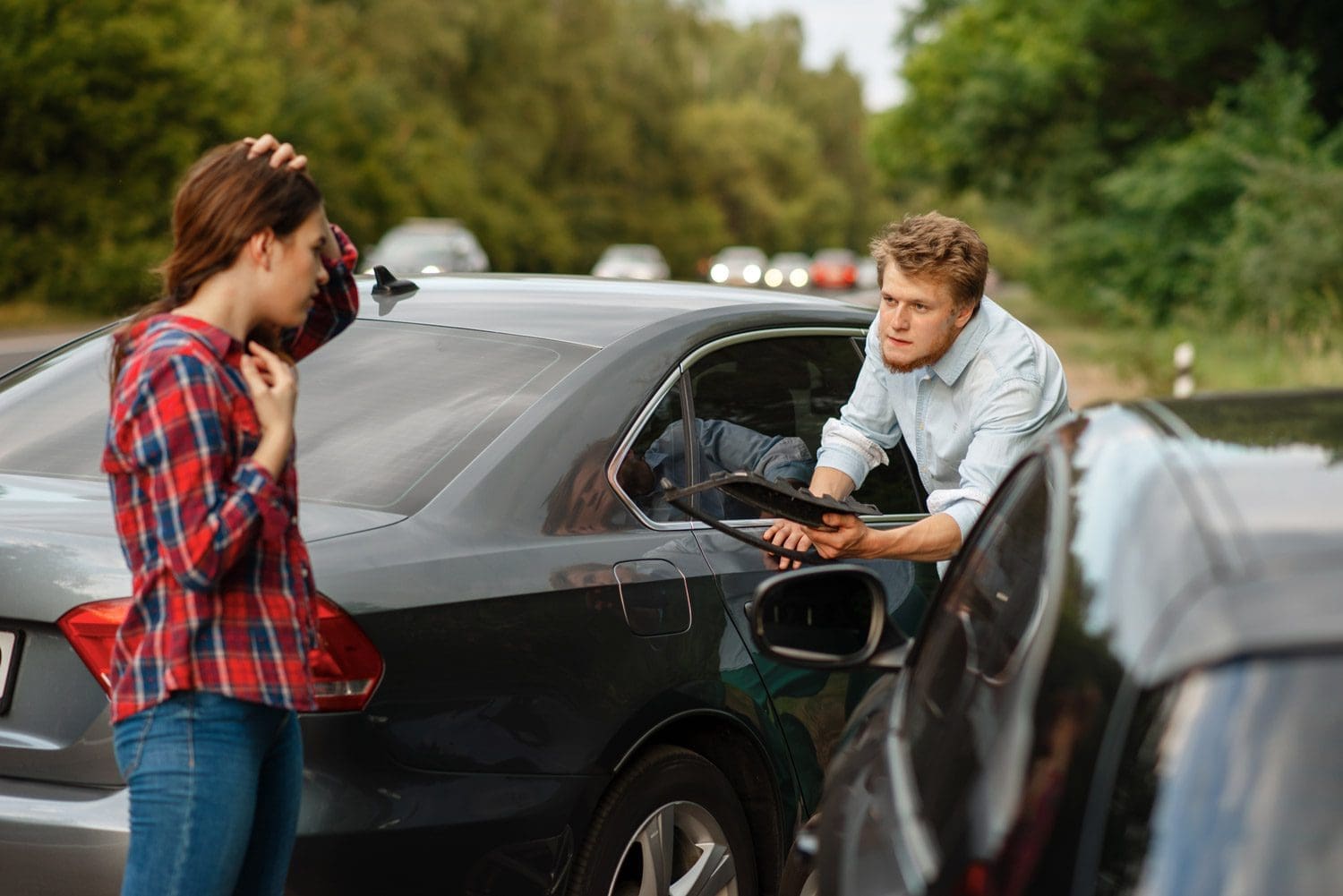 Two people who were in a car accident talk it out in McMinnville, Oregon
