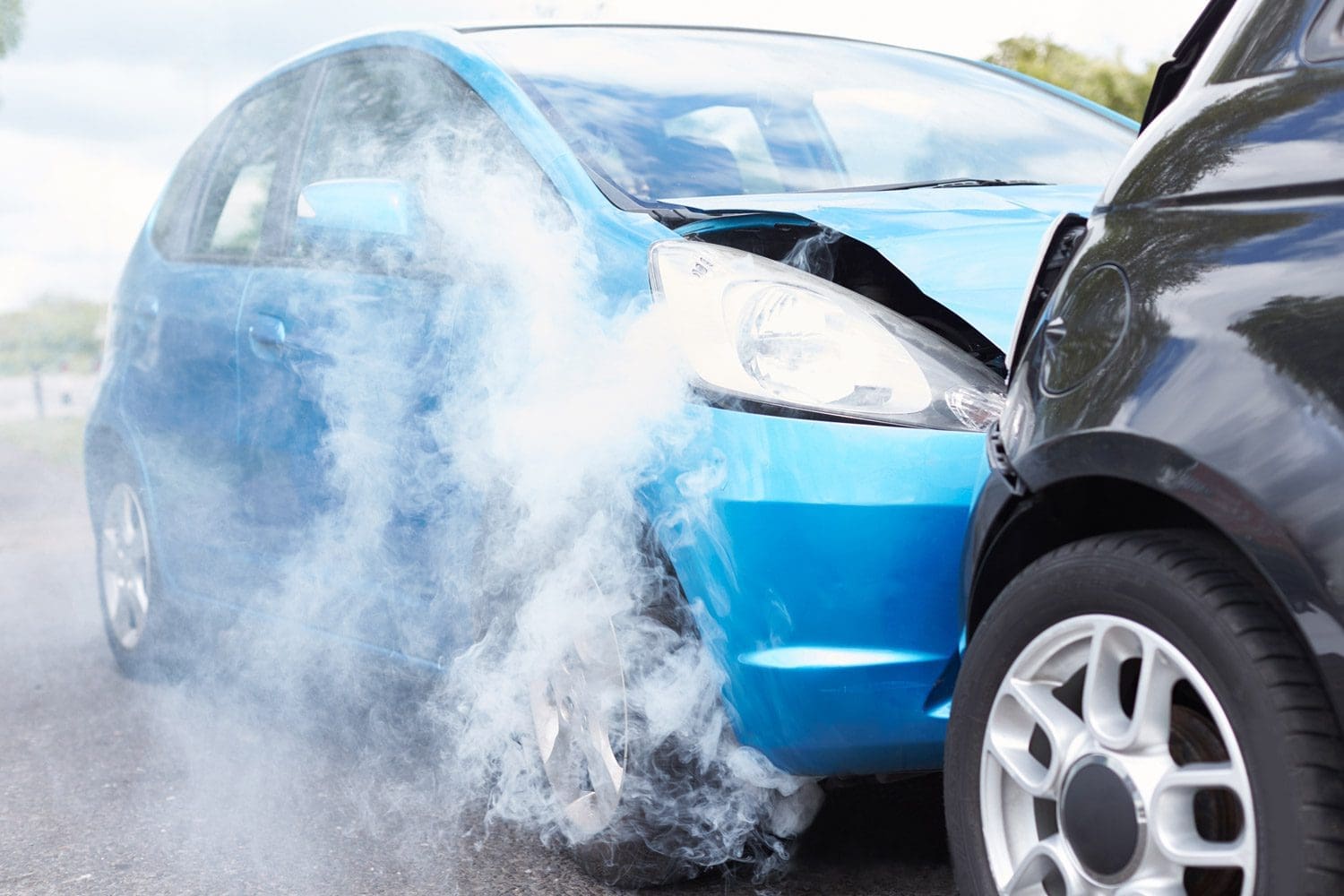 Two cars in a rear end collision.