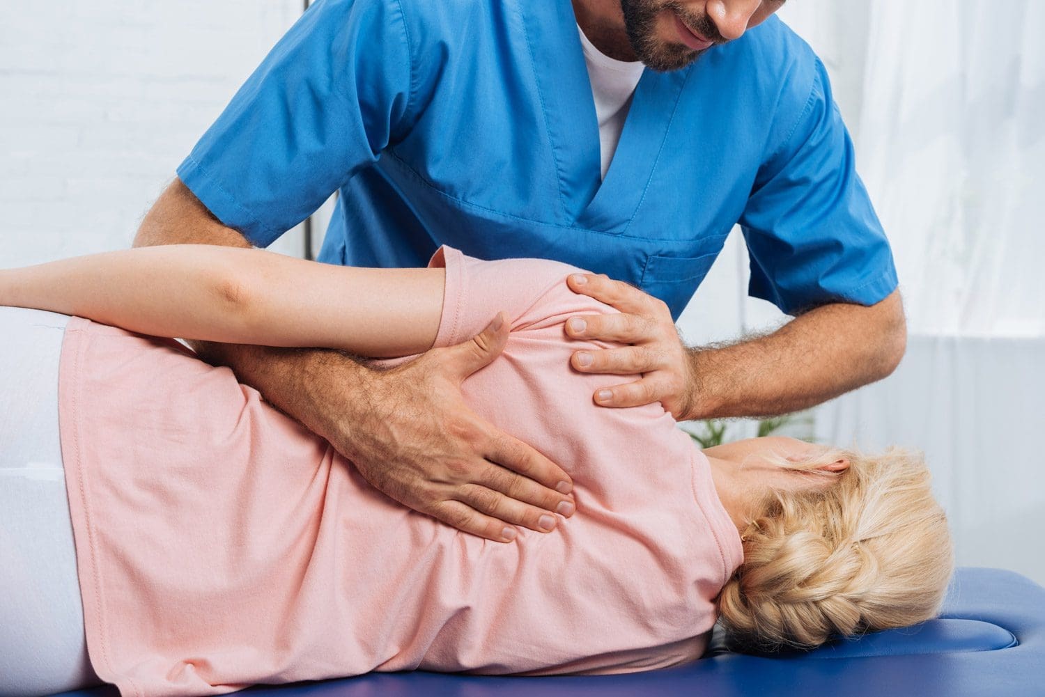 A Chiropractor in Salem treats a woman who has auto accident injuries.