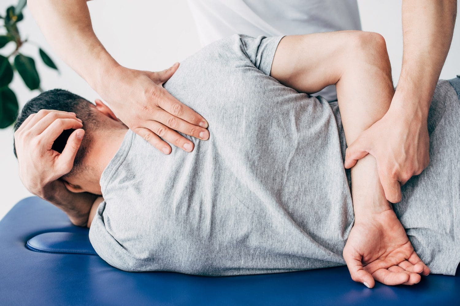 Gresham Chiropractor treating shoulder pain.