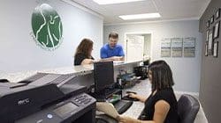 Salem Chiropractic Clinic receptionist helping a new patient.