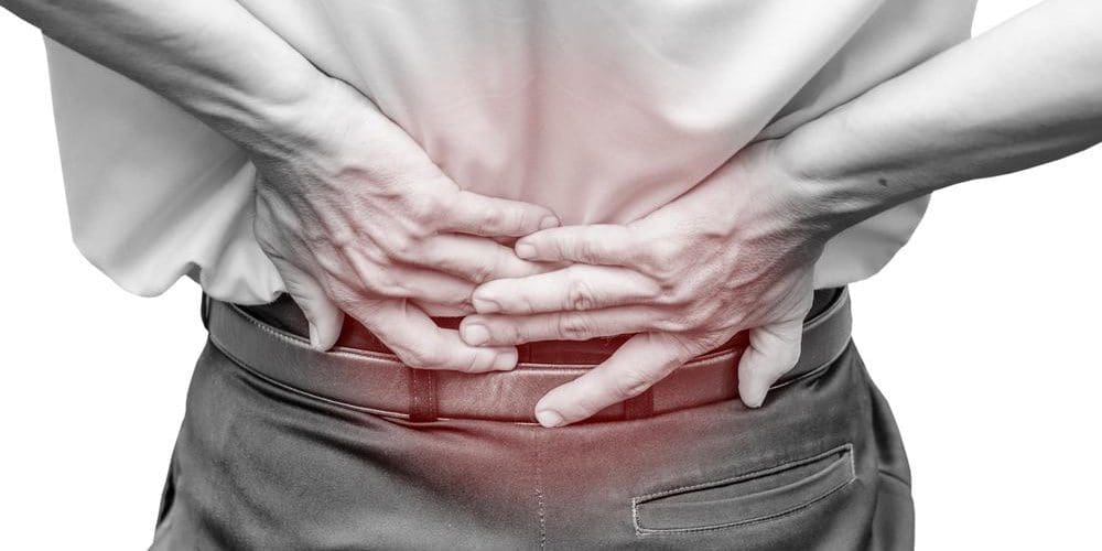 A man is suffering from lower back pain.