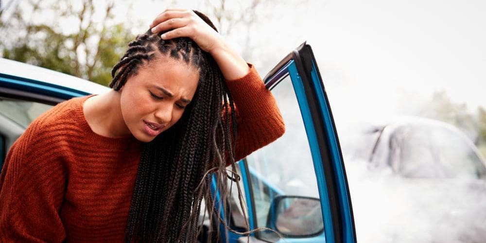 A woman is suffering from a mTBI after a car accident.