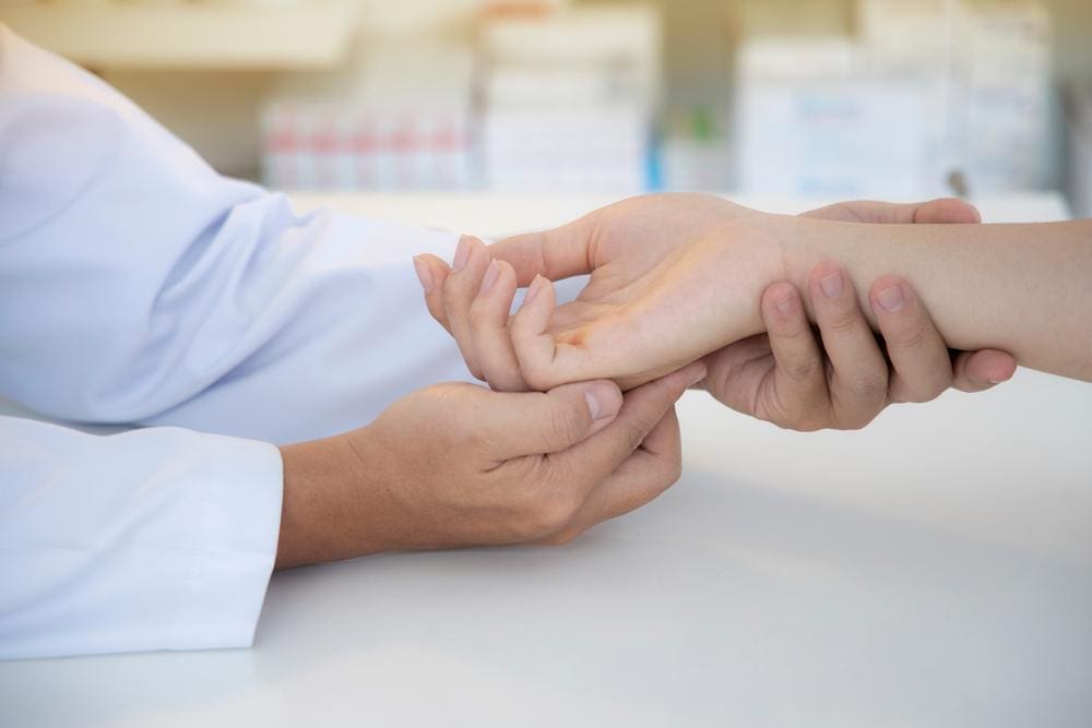 A chiropractor is treating a patient for numbness and tingling. 