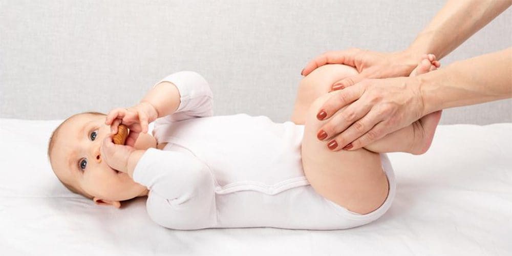 A baby is laying down.