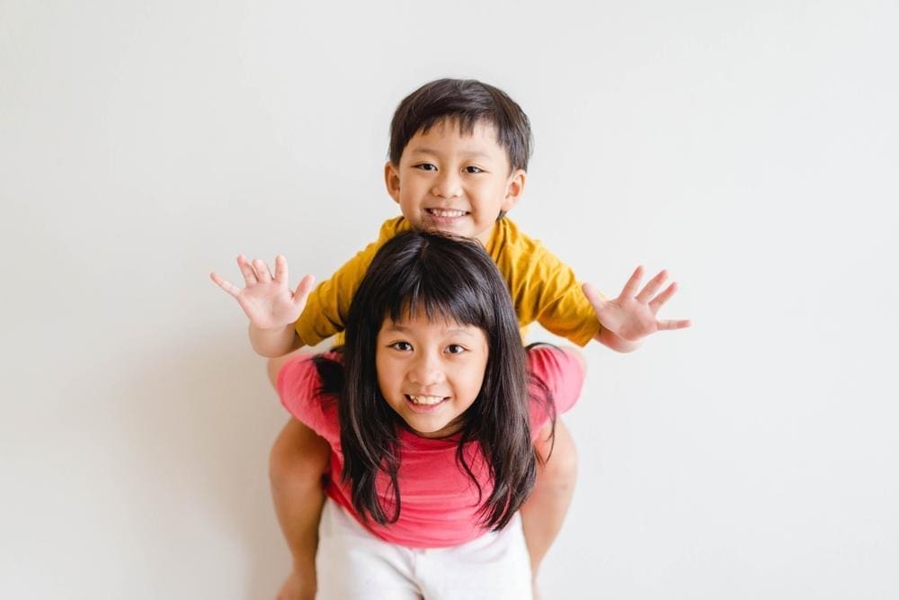 Two children are happily playing.