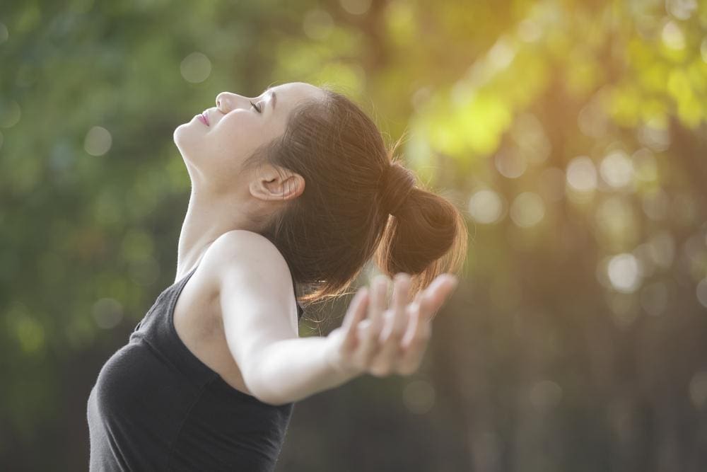 A woman is happy now that she has improved her mobility. 