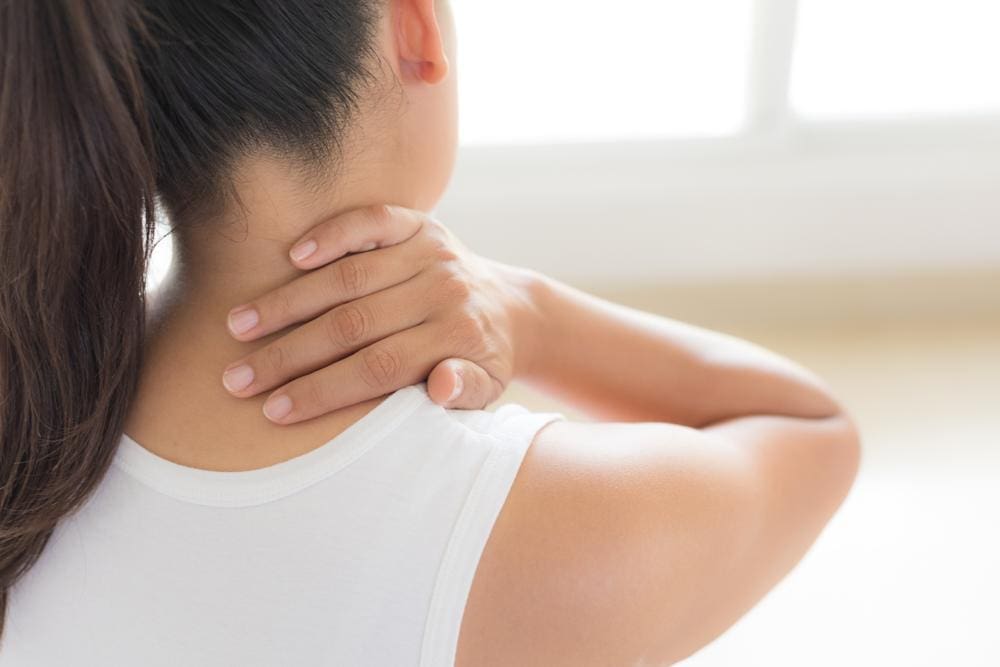 A woman is suffering from a bone spur.