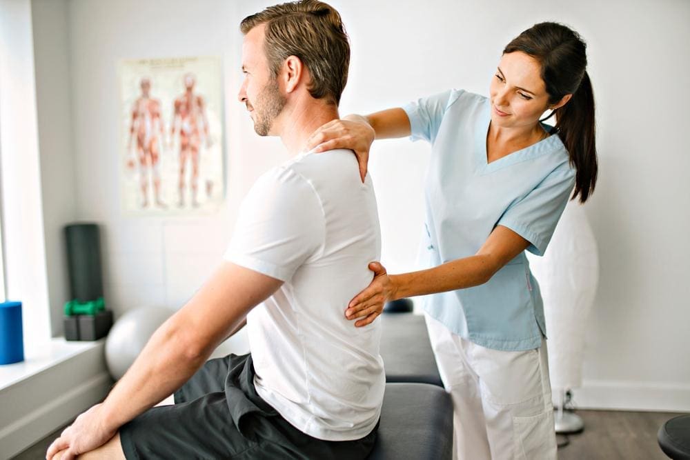 A man is getting chiropractic treatments to help with his insomnia. 
