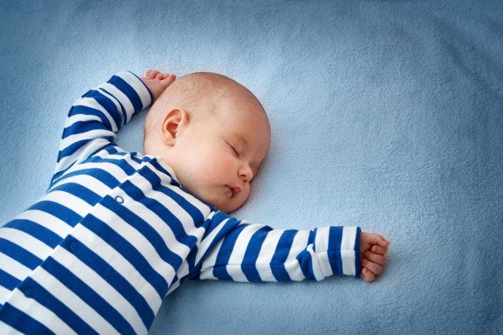 A baby sleeping peacefully. 