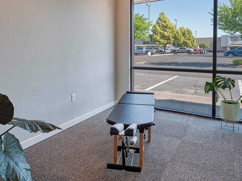Chiropractic treatment room at Accident Care Bend Chiropractic Clinic.