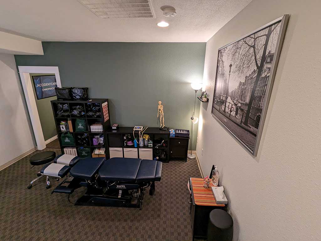 Gresham Clinic treatment room with adjustment table.