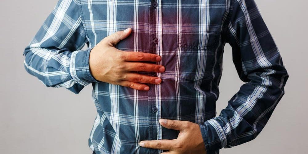Man with symptoms of heartburn.