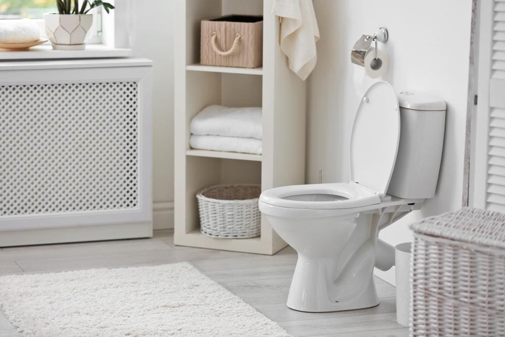 A clean, white home bathroom.
