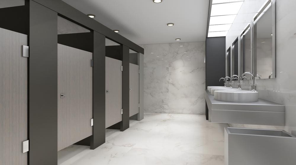 A clean, modern women's public restroom.