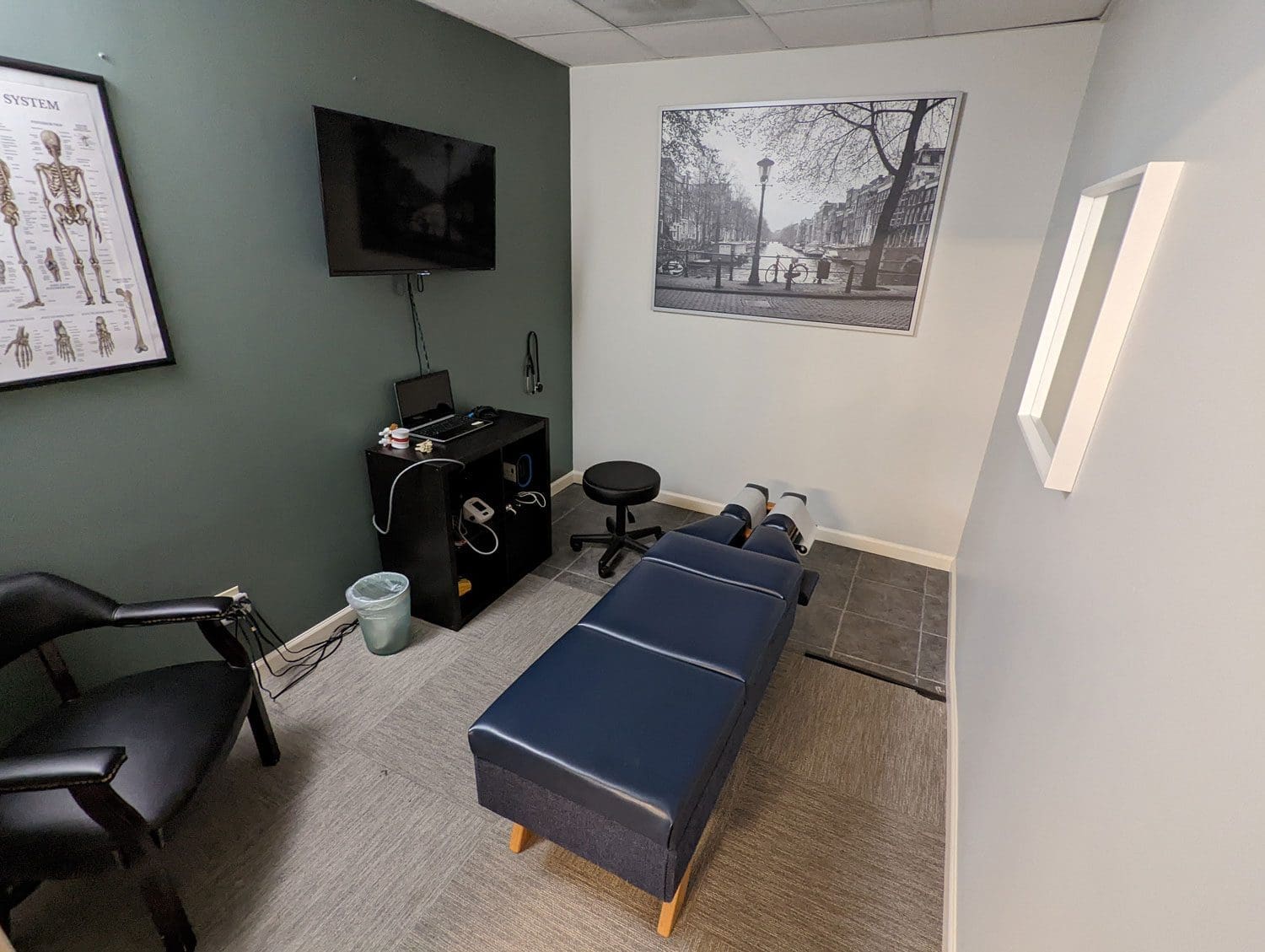 NE Portland Chiropractor treatment room with chiropractic adjustment table.