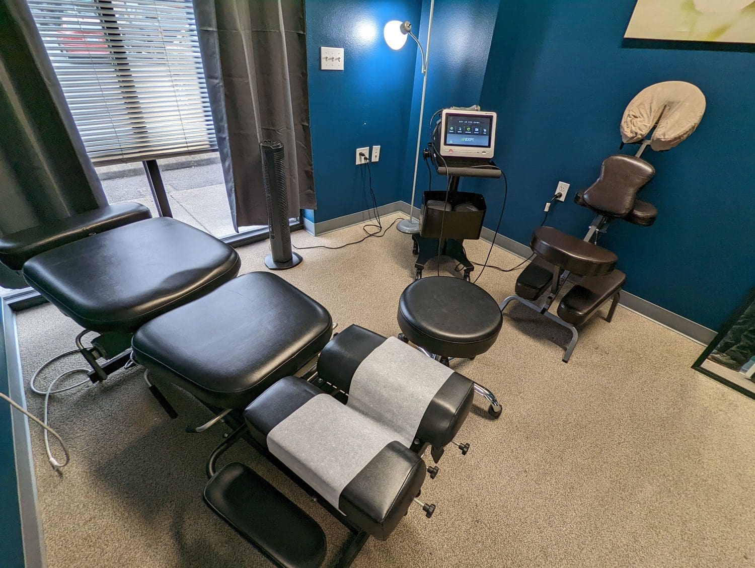 Vancouver chiropractic treatment room with adjustment tables.