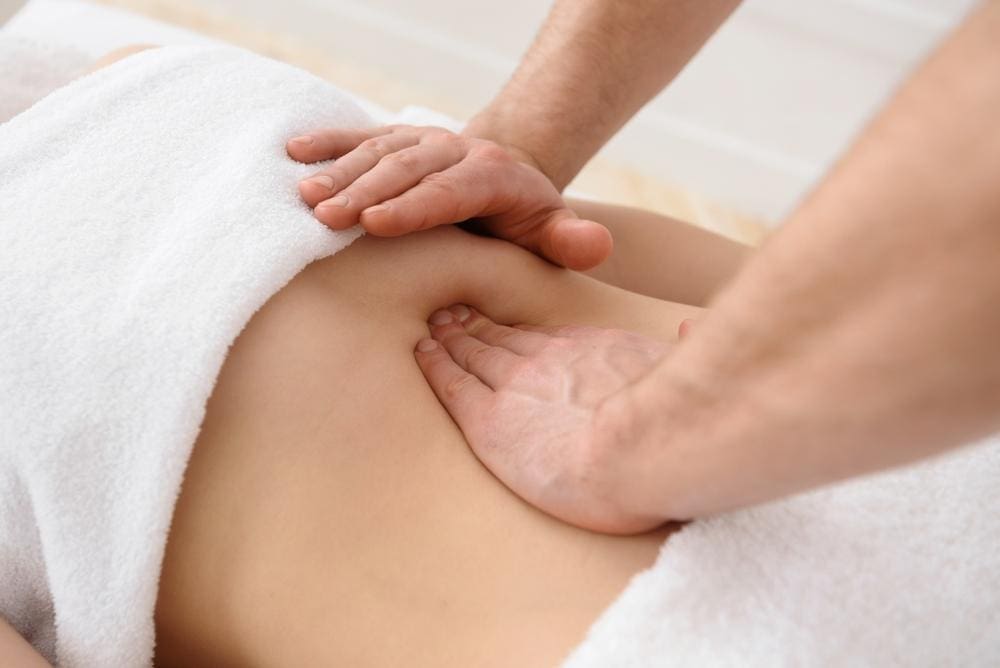 A chiropractor is treating a patient to manage shingles pain. 